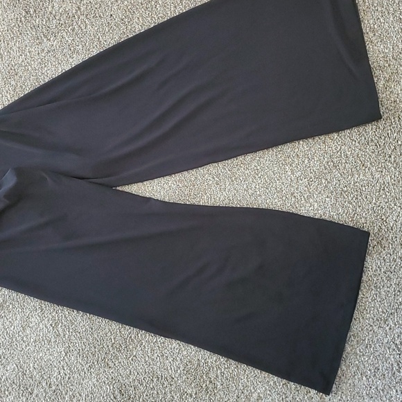 Haulter jumpsuits. Black and white striped top. Black bottom Wide leg. By Lepis - Picture 3 of 8